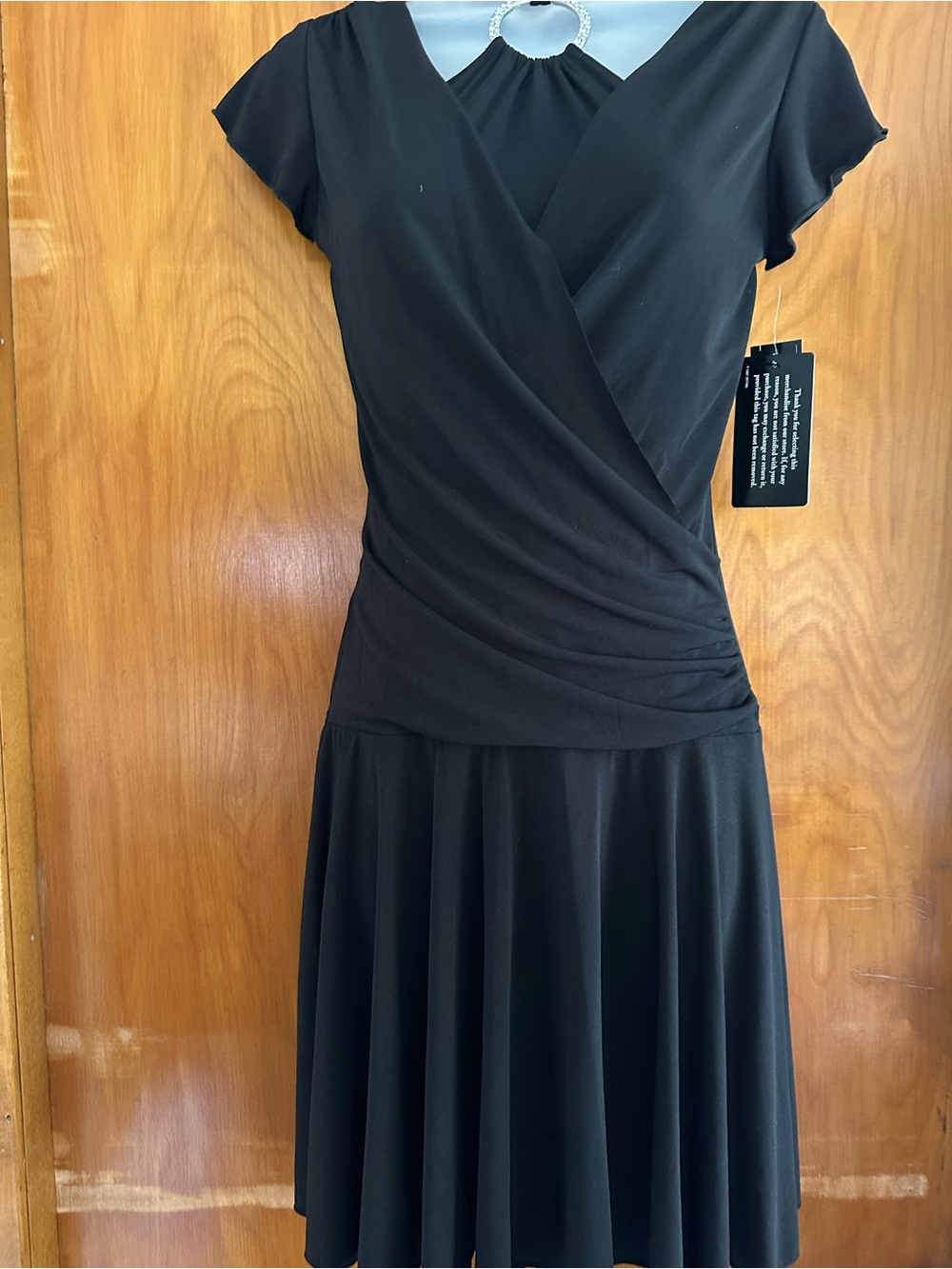Example:

BCX NWT Little Black Halter Cocktail Dress M